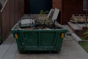 dumpster in driveway